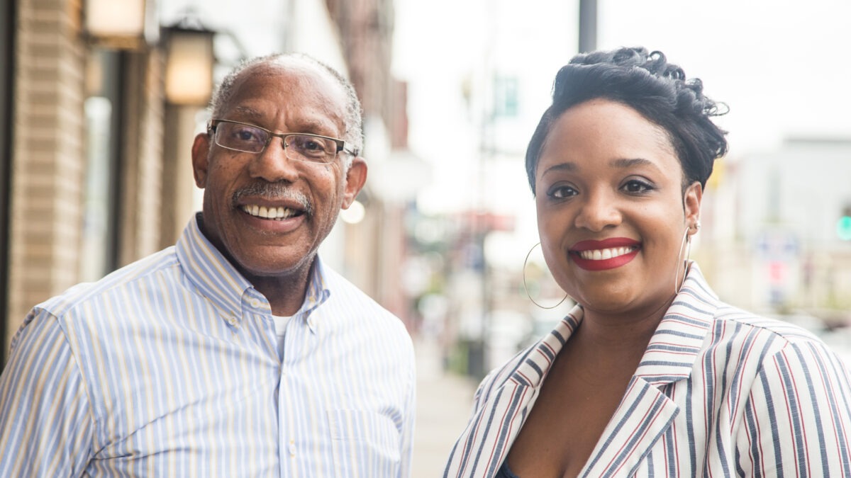 Warren McLean and Erin Jordan stand in front of NEON in North Minneapolis