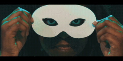 A gif of African American youth from the Healing with a Groove 2.0 in Mississippi taking off a white mask.