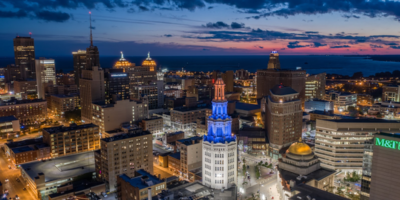 Electric Tower lit up in colors of Community Foundation of Greater Buffalo, an organization looking to increase racial equity in Buffalo.