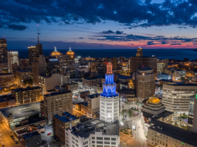 Electric Tower lit up in colors of Community Foundation of Greater Buffalo, an organization looking to increase racial equity in Buffalo.