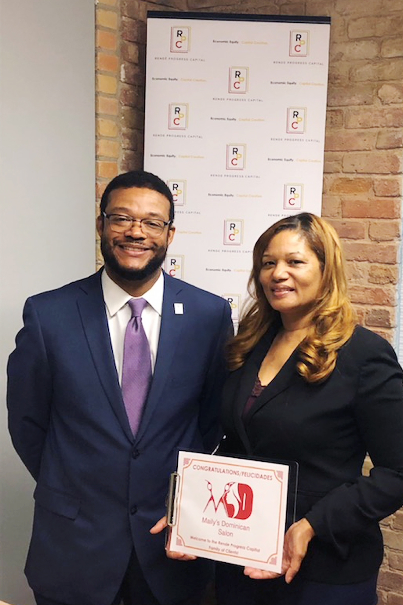 Eric Foster and Clara Guevara, owner of Maily's Dominican Salon and Spa in Grand Rapids, Michigan.