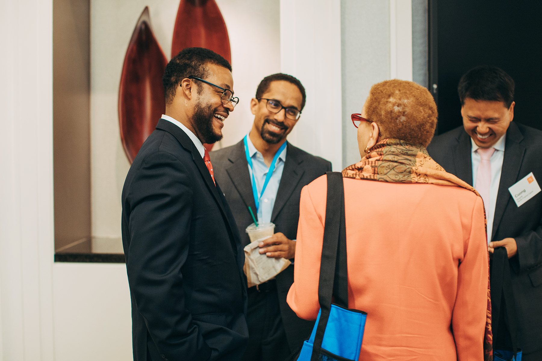 Eric Foster talking with other attendees at the 2019 MDI Portfolio Summit hosted by W.K. Kellogg Foundation in Detroit, Michigan.