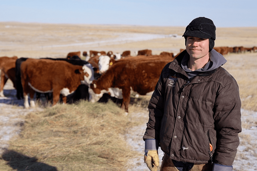 IAC producer with livestock. Photo courtesy of IAC.