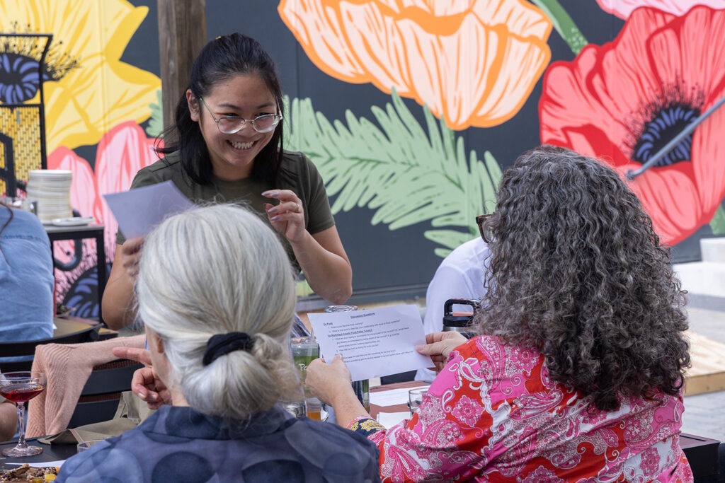 Group of people talking | W.K. Kellogg Foundation