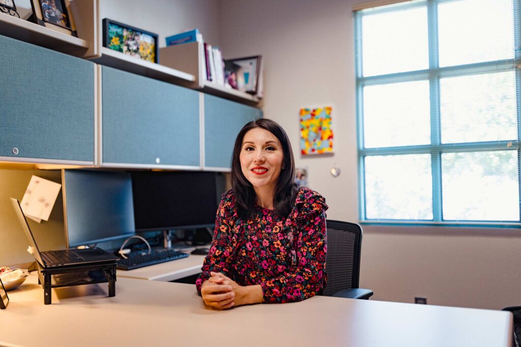 The director of First Born and More's model office in Santa Fe, Mayra Gutierrez, is working to expand the organization's research-backed program nationwide.