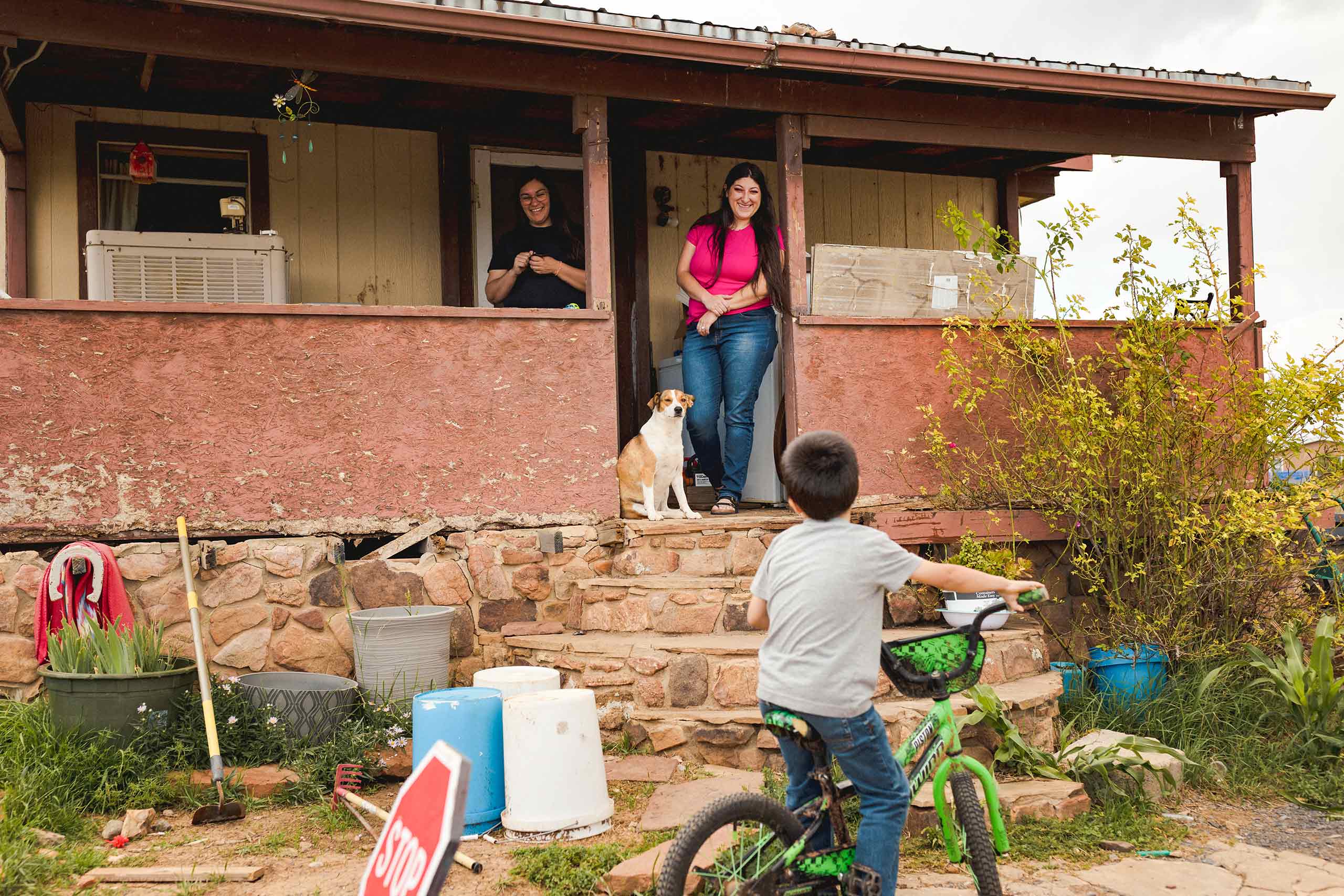 During a recent visit, 5-year-old twins Armando and Marcos show off their new biking skills. Look! No training wheels!