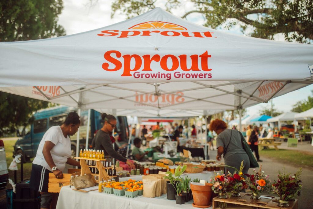 Sprout-supported farmers sell fresh produce at New Orleans farmers markets, connecting families with locally grown food.